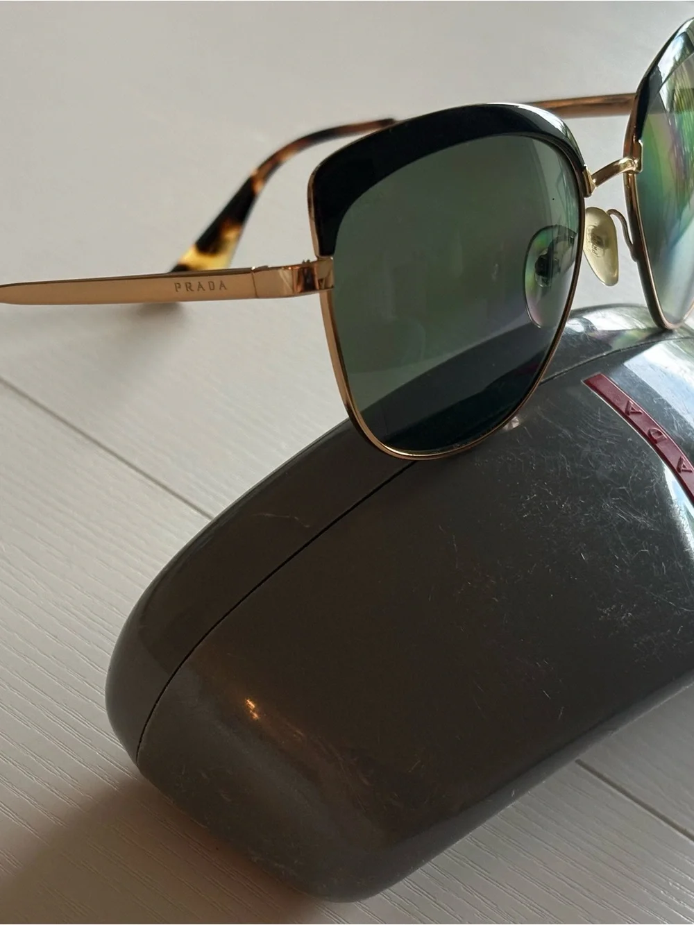 Prada Gold Frame Sunglasses with Dark Green Lenses